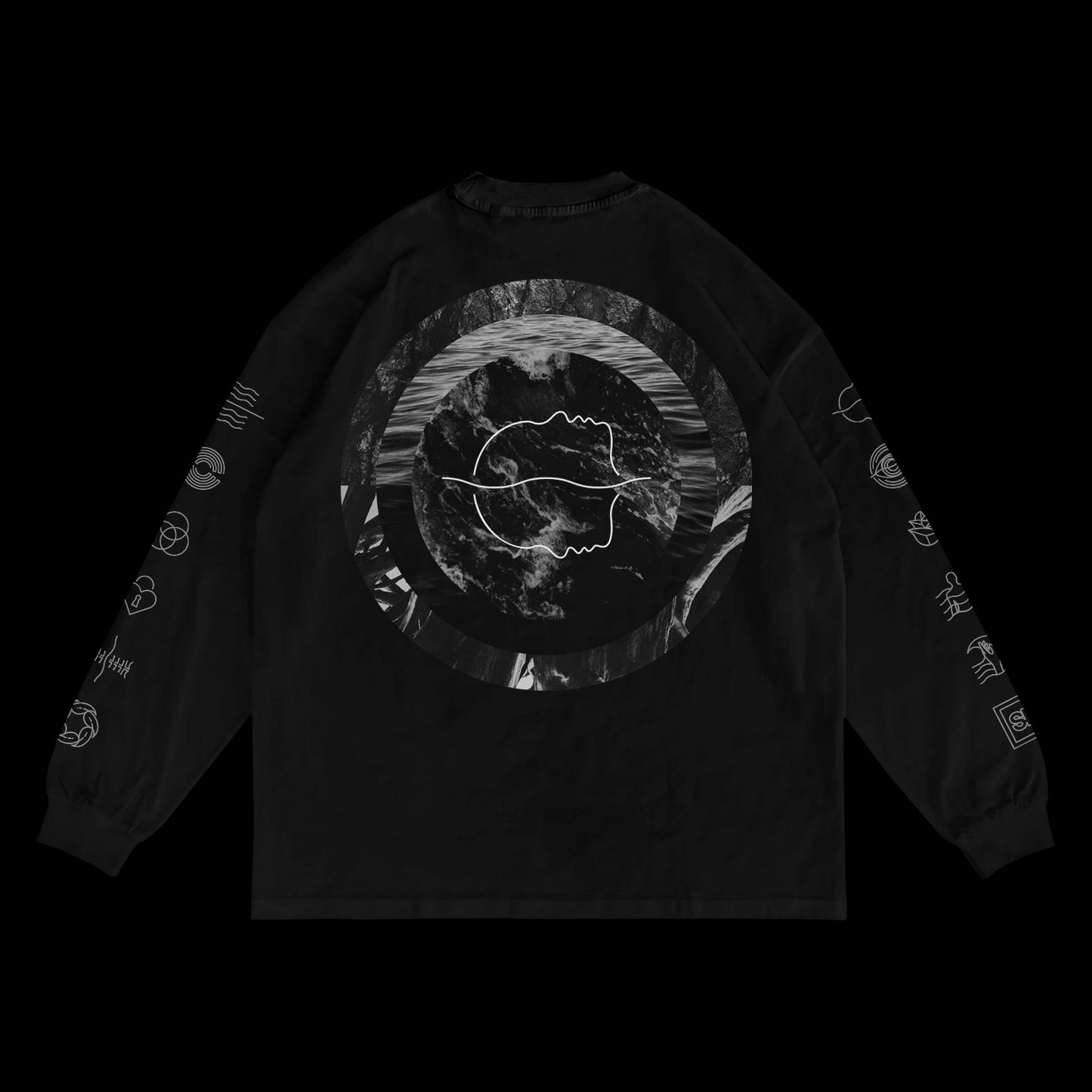 A black long-sleeve shirt by Spiritbox featuring a large circular graphic with abstract faces and a marbled background on the back, plus multiple small white icon illustrations along the sleeves for a distinctive printed look.