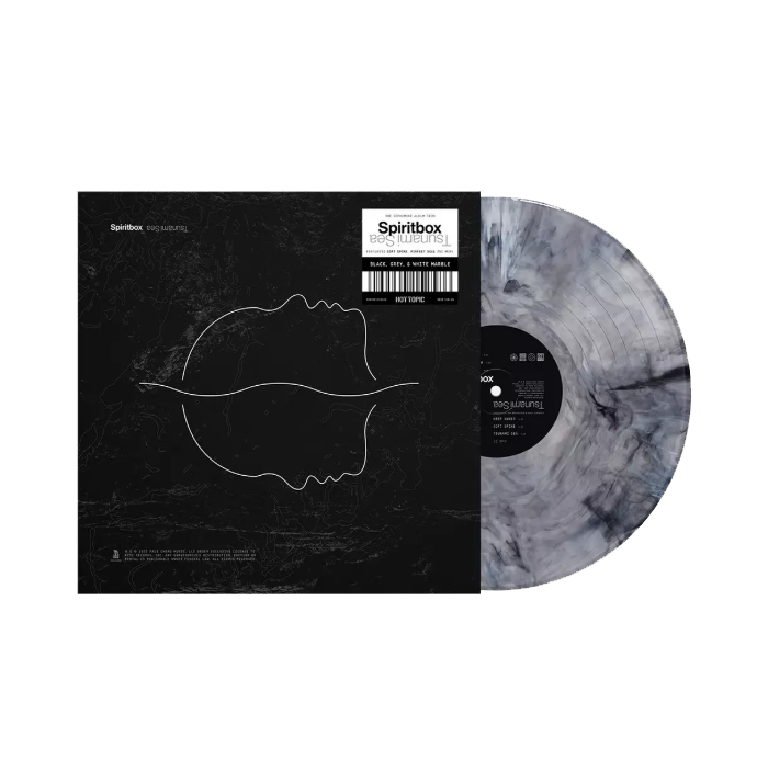 A marbled black and white Spiritbox vinyl record partially slides out of a black album cover with thin, abstract white line art of two mirrored faces. A white label displays the album’s title and artist info.