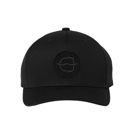 A black Spiritbox snapback hat with a subtle, embroidered circular abstract line logo on the front, shown against a plain white background.