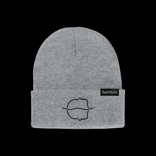 A heather grey beanie by Spiritbox with a minimalist black embroidered face and lips, folded cuff, and a small rectangular black Spiritbox tag. Displayed on a solid black background. Perfect for TSTW 2025.
